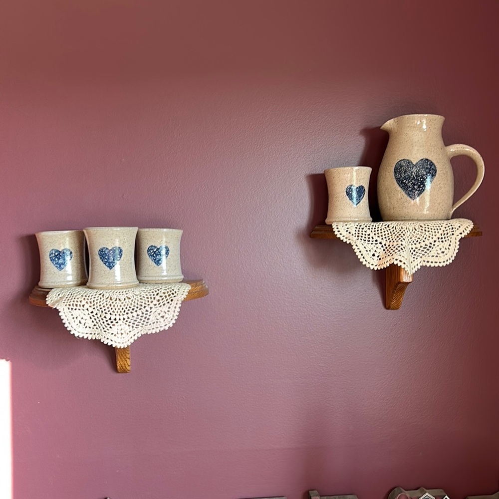 Pottery Pitcher and four cups shelves included ( will sell without shelves).